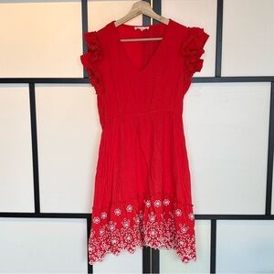 Solitaire women’s dress with eyelet detail. Size Small